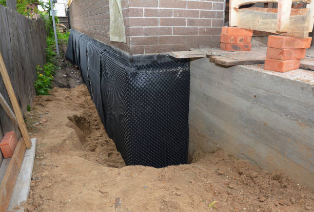 SJ Waterproofing Pros technician performing targeted Basement Waterproofing assessment in Northvale, NJ